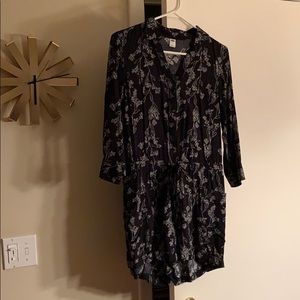 Cute romper! Black with white floral print.